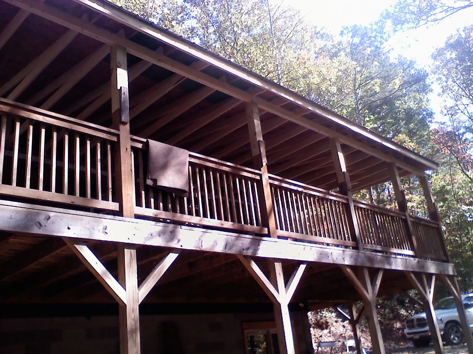 Timber framing under a new elevated porch and deck — Roof Leak Repair in Lebo by Roofing Brothers